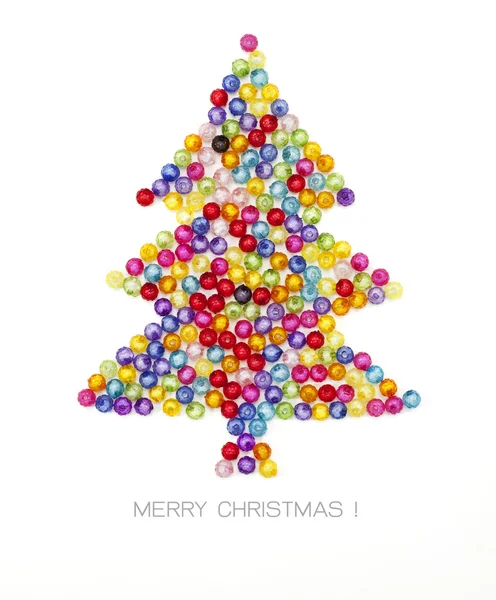 Christmas tree decorate by colorful beads on white background — Stock Photo, Image