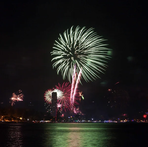 Beautiful fireworks celebrating new year on patong beach thailan — Stock Photo, Image