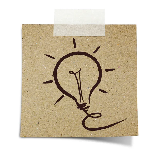 Hand draw light bulb on note taped recycle paper — Stock Photo, Image