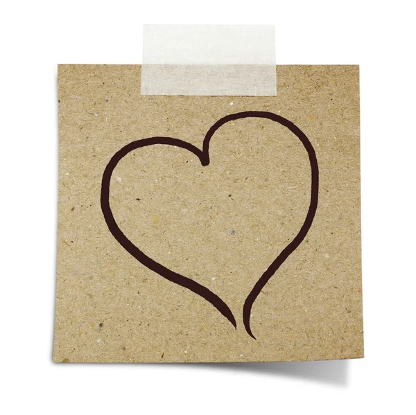 Hand draw heart shape on note taped recycle paper — Stock Photo, Image