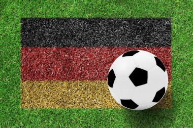 Futbol topu yeşil çim backg boyama olarak Almanya bayrağı