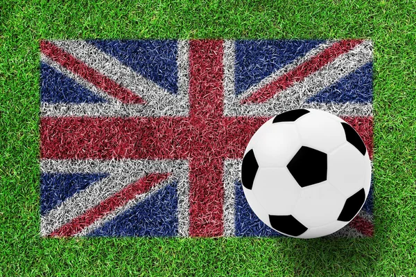 Pelota de fútbol en la bandera de los británicos como pintura sobre hierba verde backgr —  Fotos de Stock