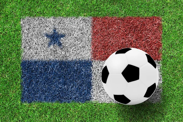 Soccer ball on flag of Panama as a painting on green grass — Stock Photo, Image