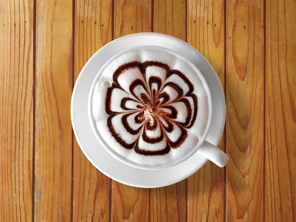 Tasse Kaffee Latte auf Holz Tisch Hintergrund — Stockfoto