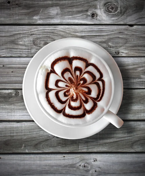 Tasse Kaffee Latte auf Holz Tisch Hintergrund — Stockfoto