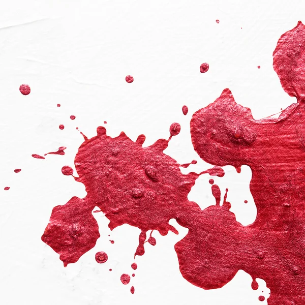 Red Color splatter on white background — Stock Photo, Image