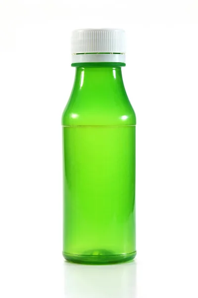 Green empty plastic bottle on white background — Stock Photo, Image