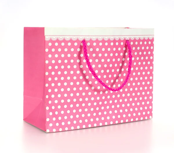 Pink shopping paper bag isolated on a white background — Stock Photo, Image