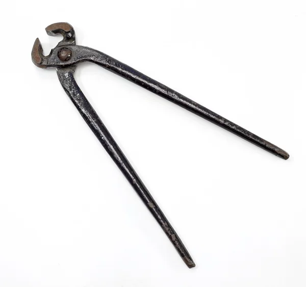 Old rusty pliers on white — Stock Photo, Image