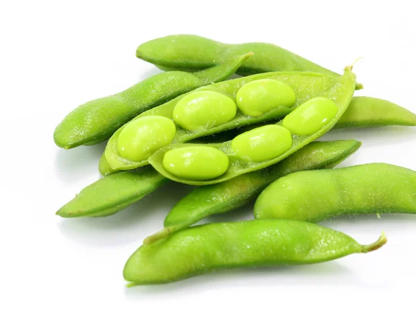 Edamame nibbles, feijão de soja verde cozido, comida japonesa Imagem De Stock