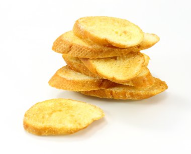 beyaz zemin üzerine dilim tost ekmeği