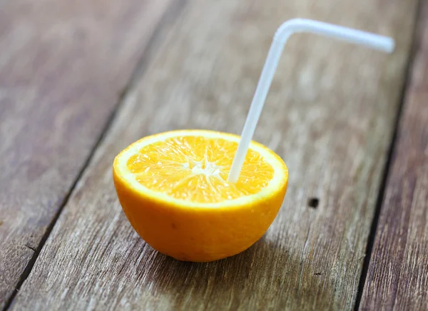 Fresh oranges on wooden background — Stock Photo, Image