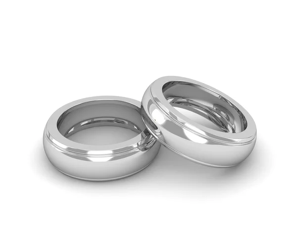 Elegantes anillos de boda de oro blanco aislados sobre fondo blanco Imágenes De Stock Sin Royalties Gratis