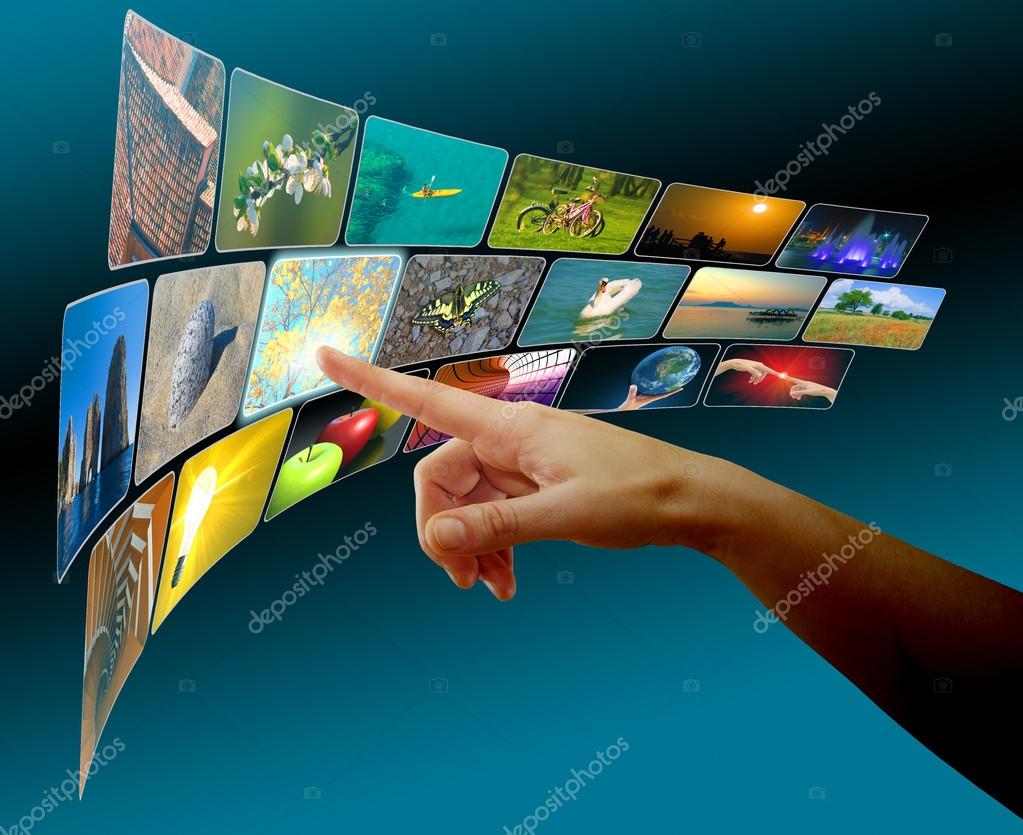 Hand browsing images in virtual space using touch screen interface, concept for e-commerce or cyberspace