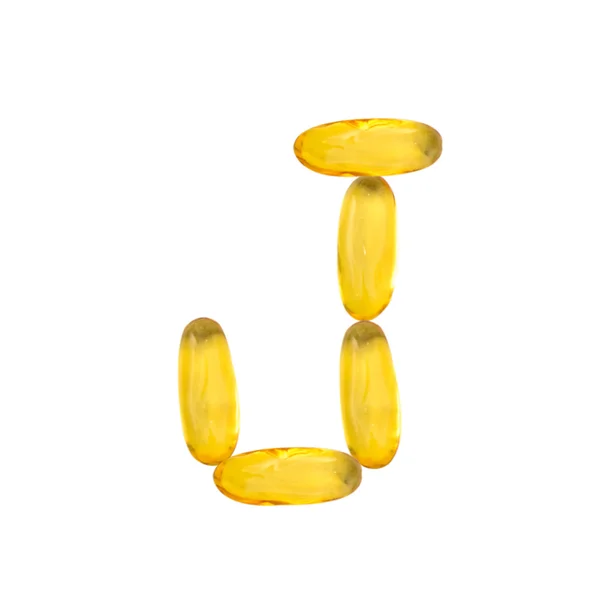 J alfabeto hecho de aceite de pescado píldora —  Fotos de Stock