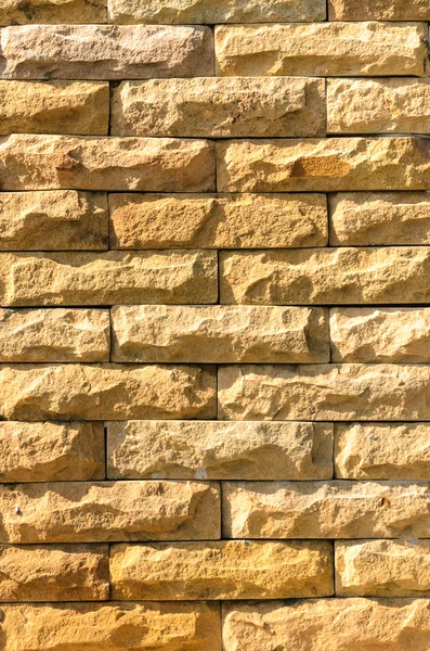 Sand stone brick wall surface, background of decorate — Stock Photo, Image