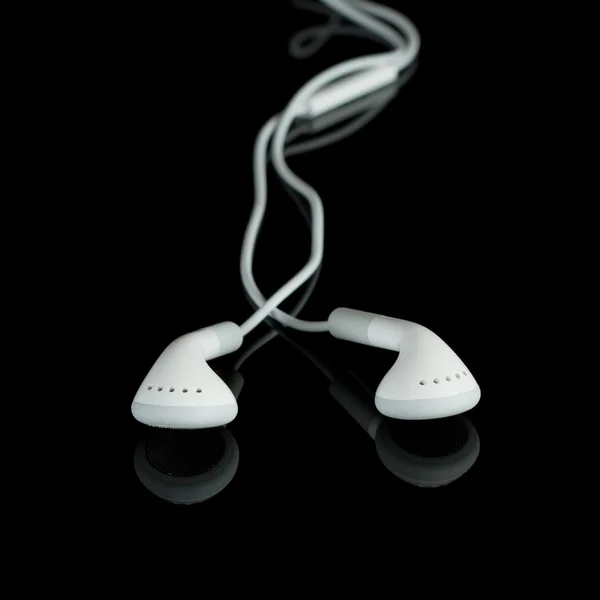 Auriculares blancos ligeros —  Fotos de Stock