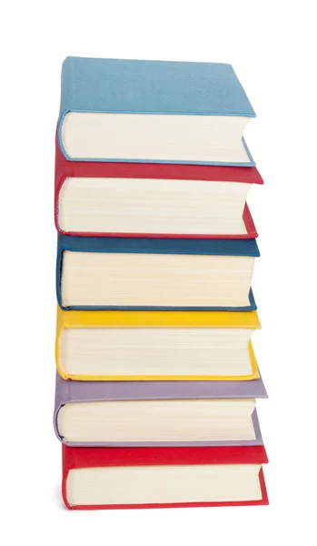 En trave böcker med färgglada omslag — Stockfoto