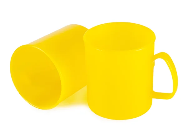 Dos tazas de plástico amarillo —  Fotos de Stock