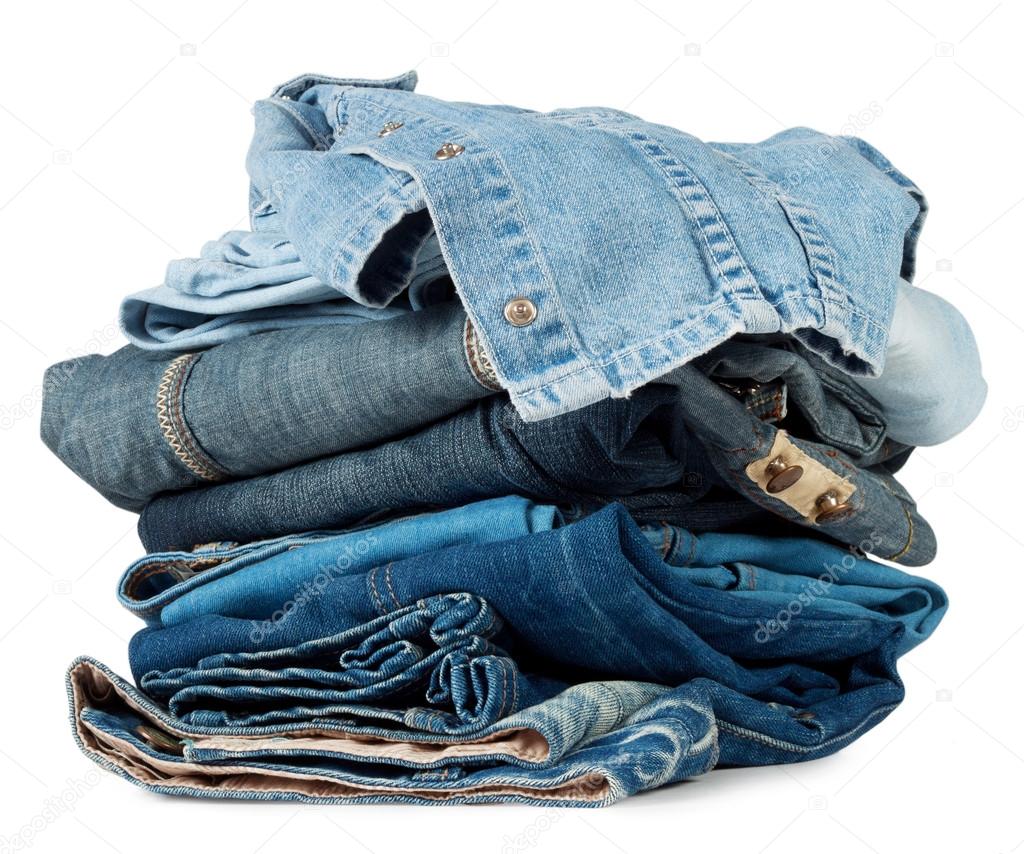 A large stack of colored denim products