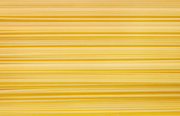 Arka plan uzun spagetti — Stok fotoğraf
