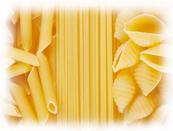 Sfondo di spaghetti ritorti e pasta dritta — Foto Stock