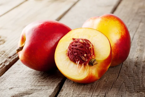 Three ripe juicy nectarine — Stock Photo, Image