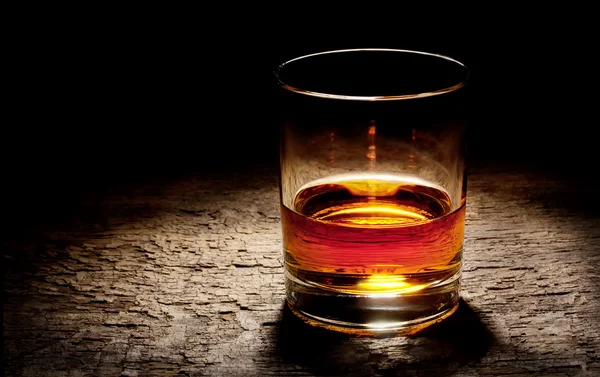 Round glass of cognac — Stock Photo, Image