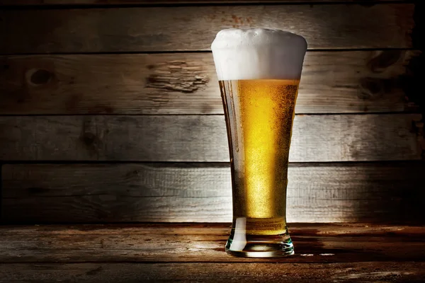 Foam glass of lager beer — Stock Photo, Image