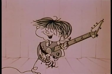 gitar dizide oynayan adam