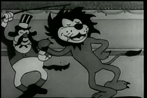 Lion and lion tamer dancing at circus