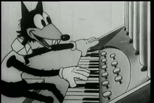 Lobo tocando órgano — Vídeo de stock
