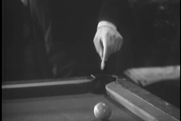 Woman retrieving note dropped in billiard pocket — Stock Video