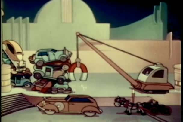 Cartoon of machine with huge magnet picking up cars in junk yard — Stock Video