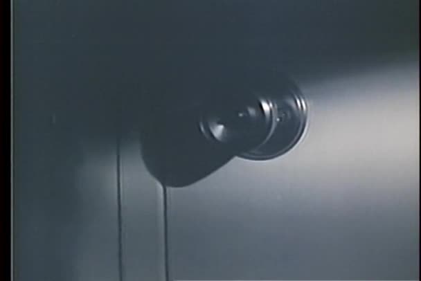 Close Up Of Doorknob Turning As Someone Tries To Break In Stock
