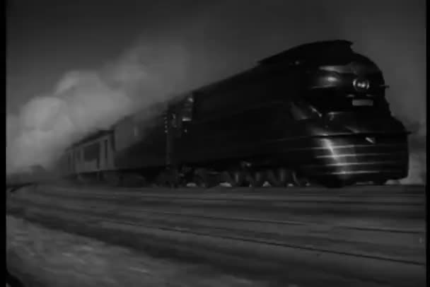 Steam train in motion on tracks — Stock Video