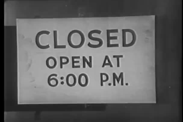 Close-up of closed sign on door — Stock Video