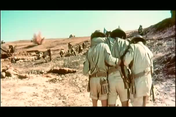 Soldiers helping a wounded comrade — Stock Video