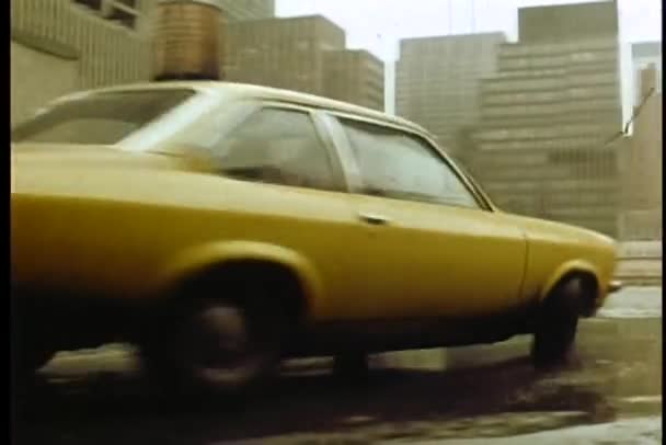 Car speeding on roof level of parking garage — Stock Video