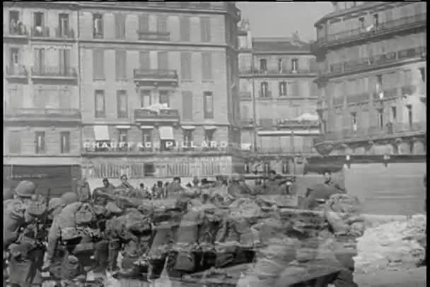 Wide shot soldiers marching through city — Stock Video