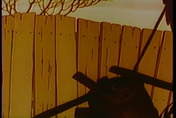 Caricature d'un combat en cours derrière une clôture — Video