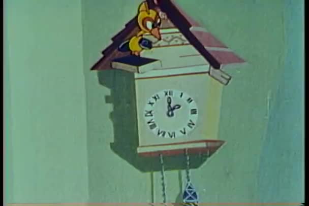 Animación de reloj de cuco pájaro sosteniendo el cartel "He Dood It " — Vídeo de stock