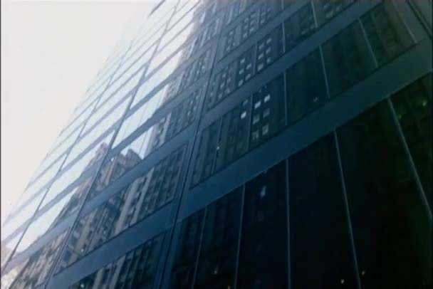 Low angle view looking up at skyscrapers — Stock Video