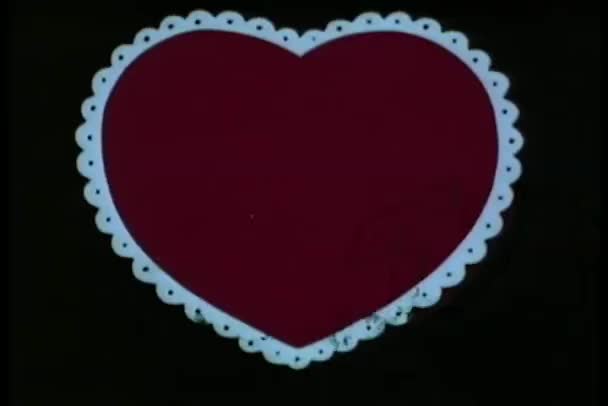 Zoom avant gros plan coeur rouge 