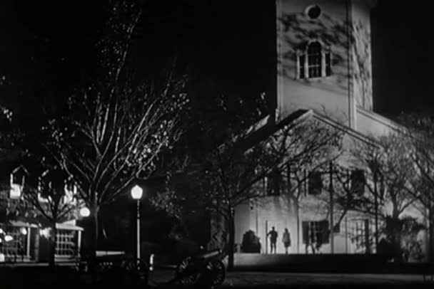 Wide shot walking into church at night — Stock Video