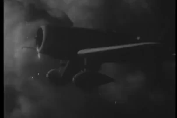 1930s airplane flying through the clouds — Stock Video