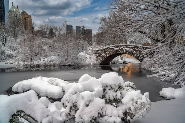 Gapstow Bridge in Central Park after snow storm in winter