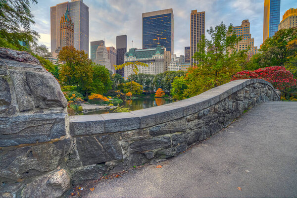 Gapstow Bridge in Central Park in autumn early in morning