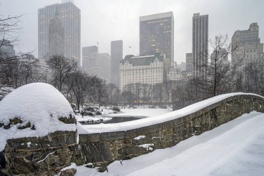 Gapstow Bridge in Central Park  on snowy morning after storm