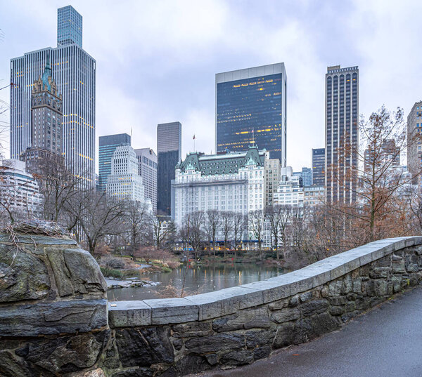 Gapstow Bridge in Central Park in winteron wet rainy day